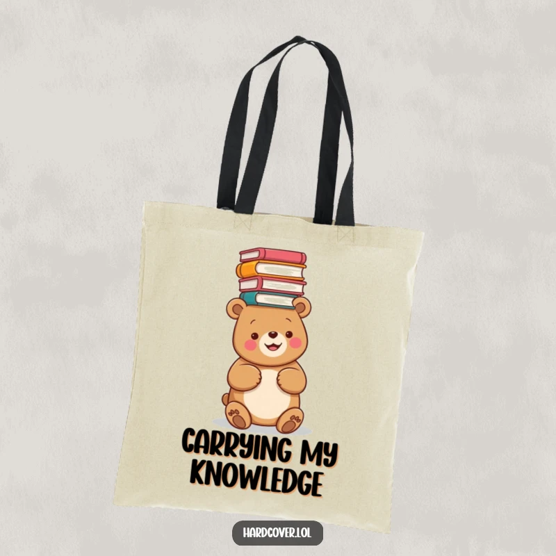 Funny tote bag showing a happy bear balancing a stack of books on its head, ideal for carrying books and other items.
